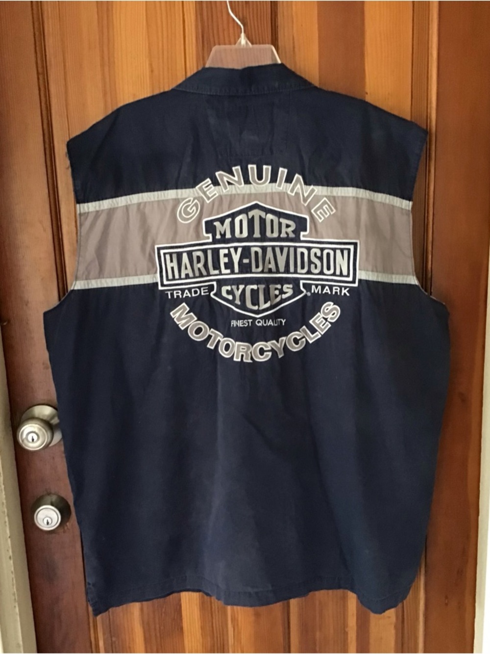 Harley Davidson sleeveless shirt.